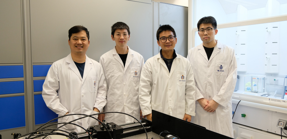 Prof. Zhou Yanguang (second right) and his PhD students Fan Hongzhao (first left), Wang Guang (second left) and Li Jiawang (first right)